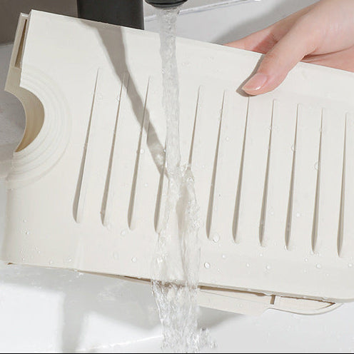 Spritzschutzmatte für Wasserhahn und Spülbecken